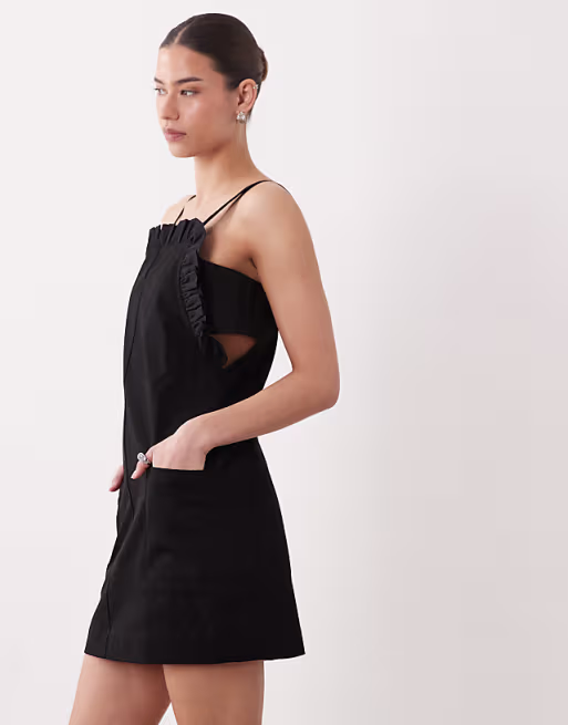 pinny mini dress with pockets and ruffles in black