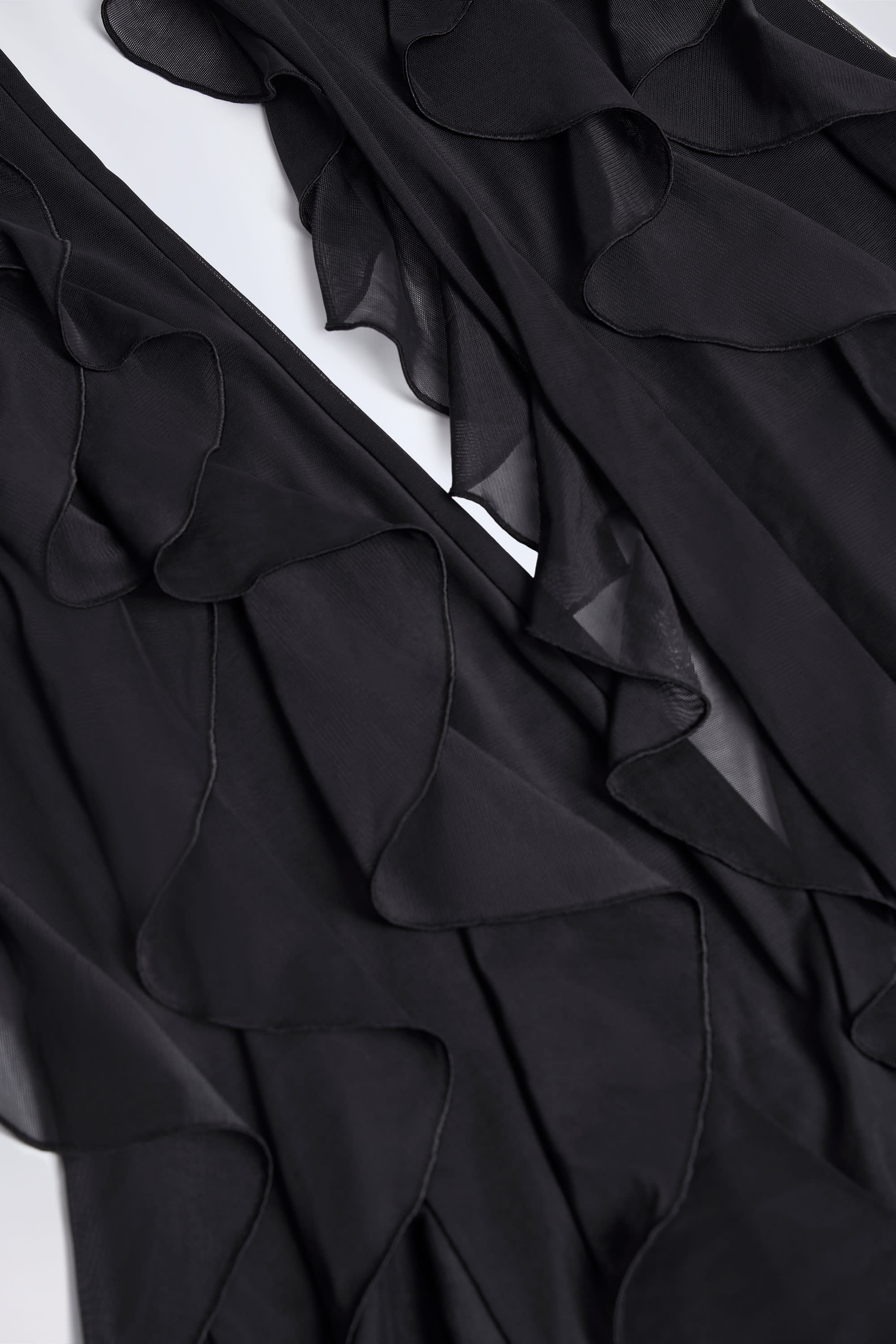 Ruffled Mid-Rise Flared Trousers in Black