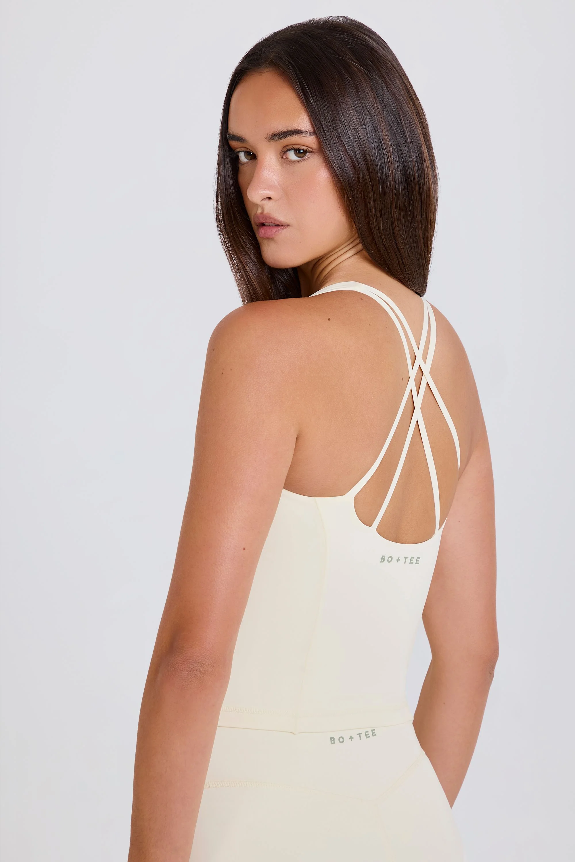 Four-Way Stretch Crossback Longline Tank Top in Cream
