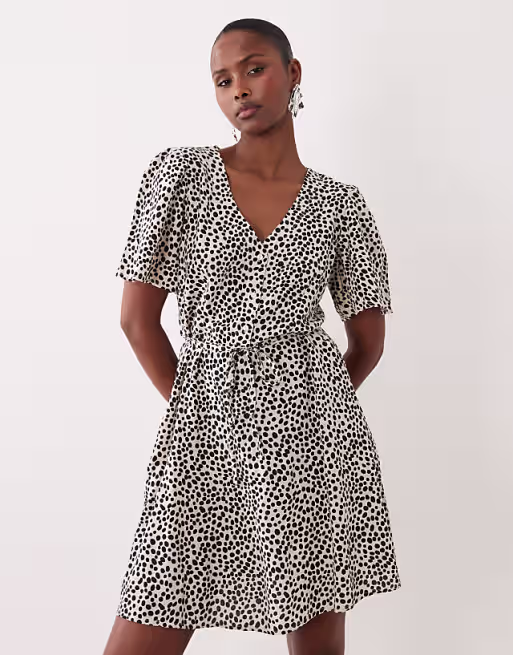 VILA tie waist polka dot mini dress in cream and black