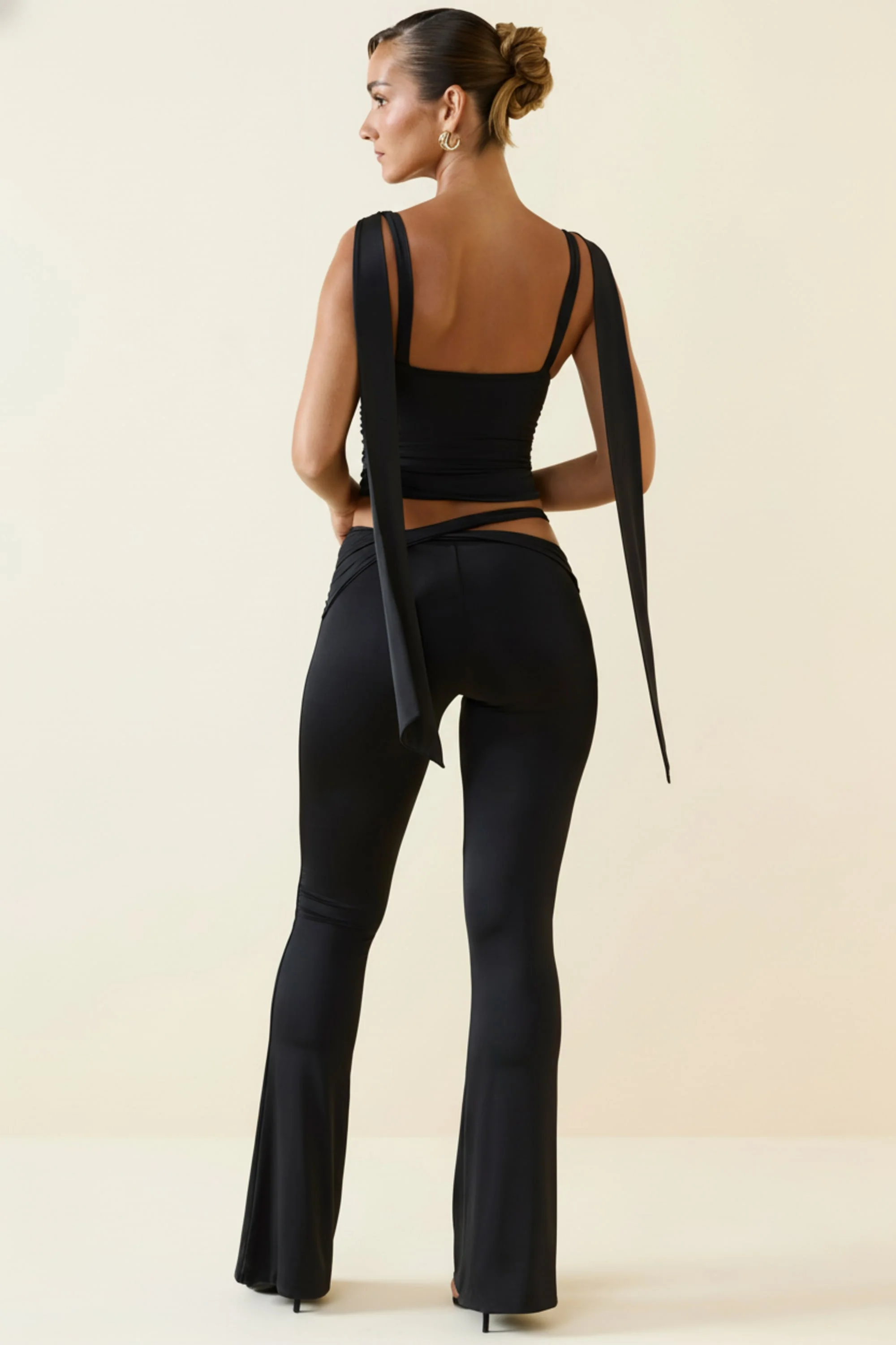Cut-Out Mid-Rise Flared Trousers in Black