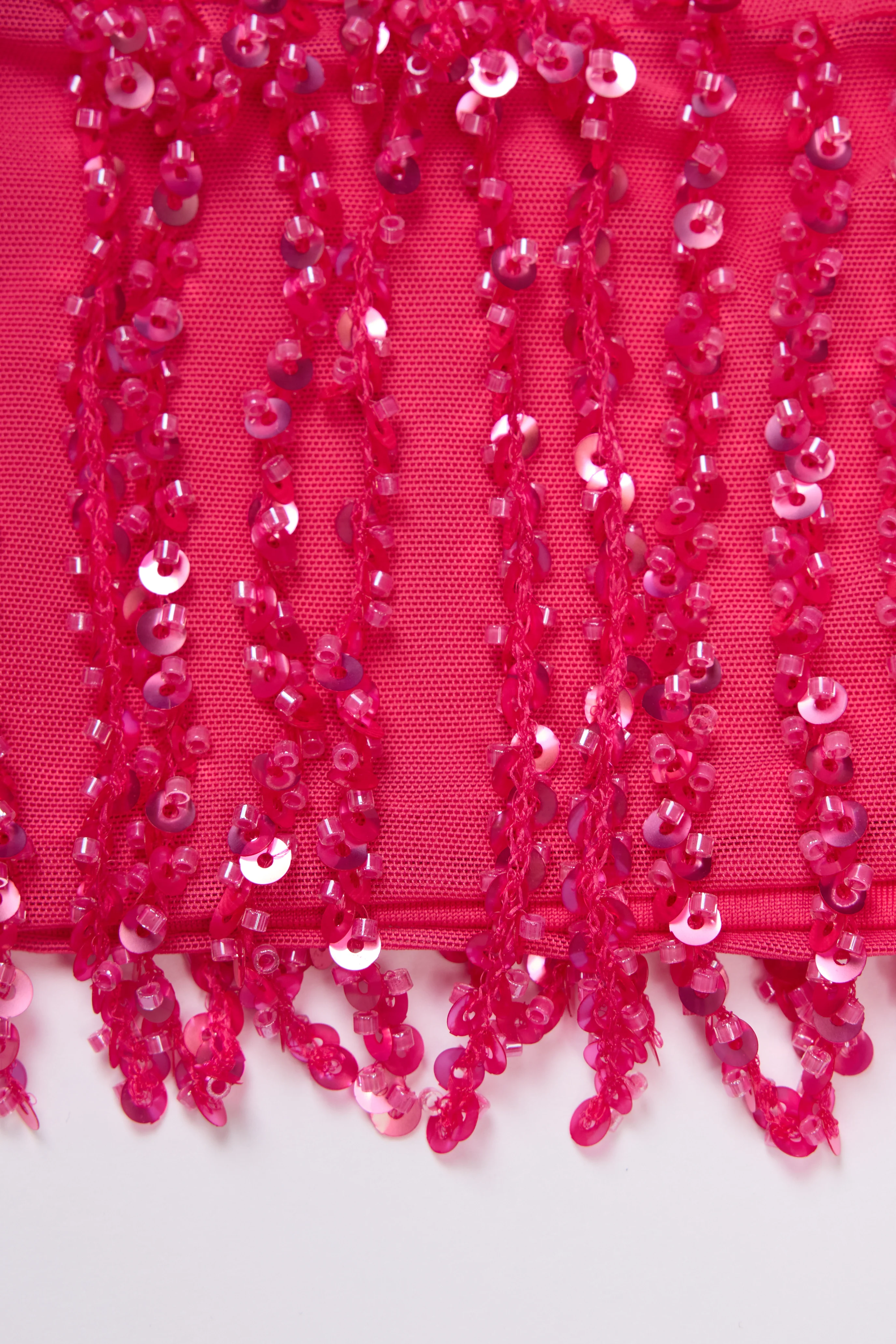 Fringed Low-Rise Mini Skirt in Raspberry