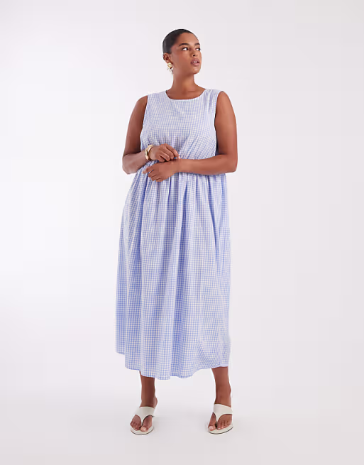 PIECES Curve sleeveless smocking ditsy floral maxi dress in pastel yellow