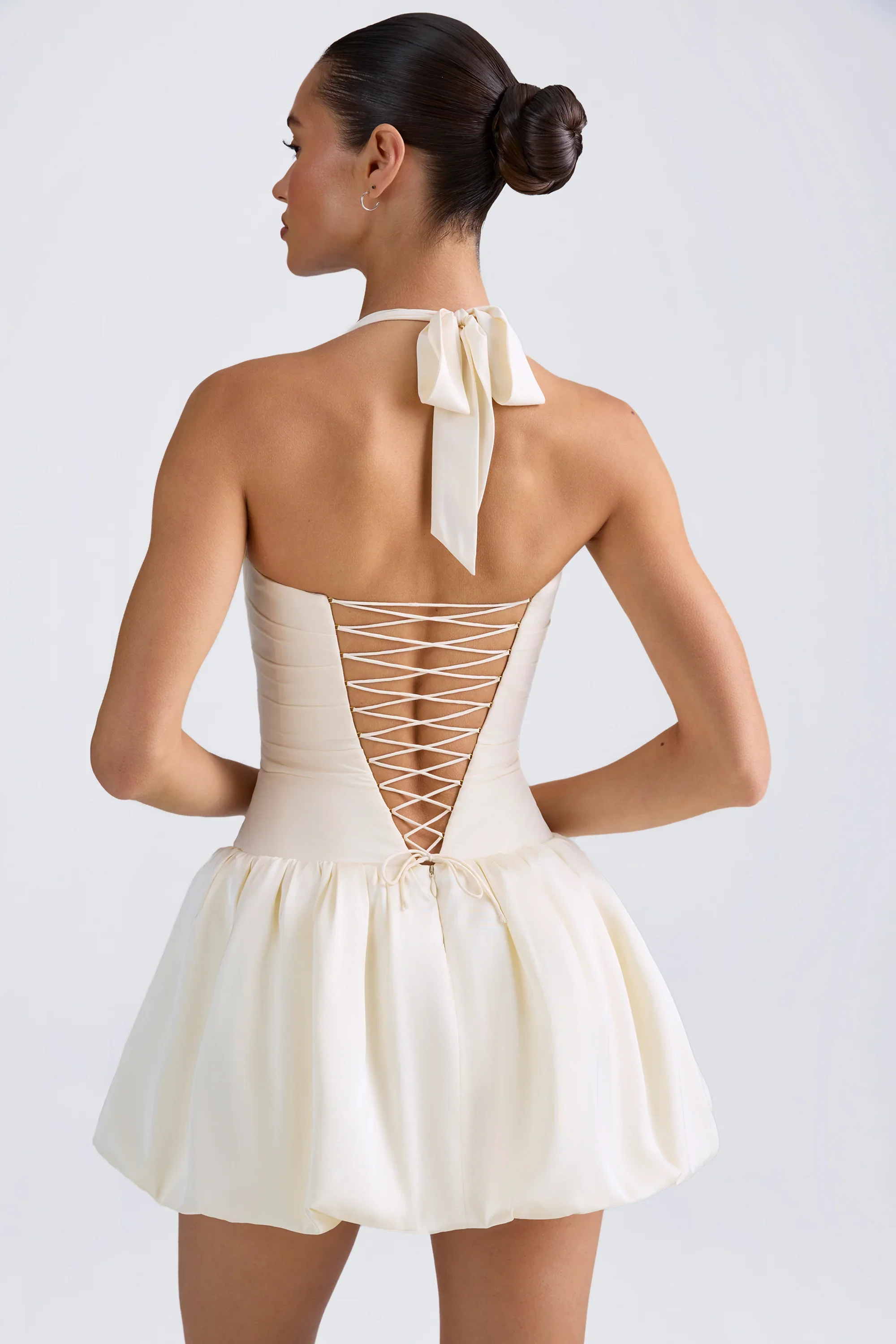 Halterneck Lace-Up Bubble Hem Corset Micro Mini Dress in Ivory - luluinthesky