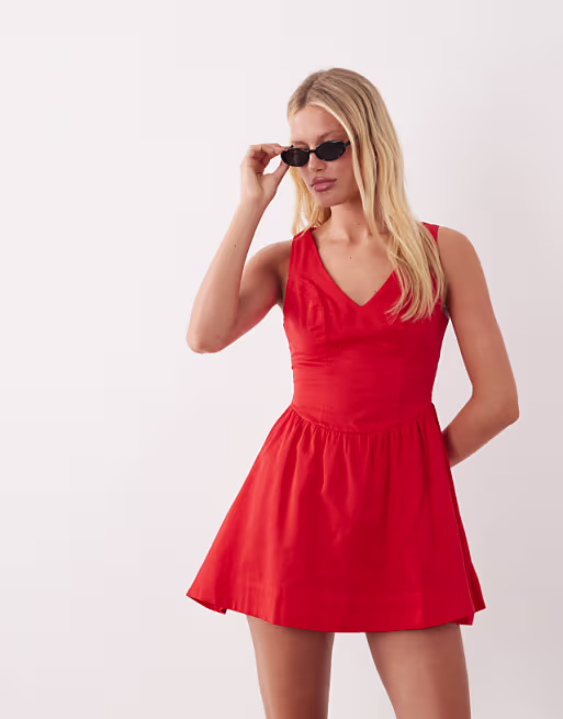 waisted v-neck mini sundress with seaming details in vibrant red