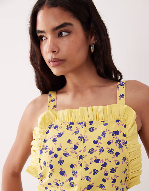 pinny mini dress with pockets and ruffles in yellow ditsy print