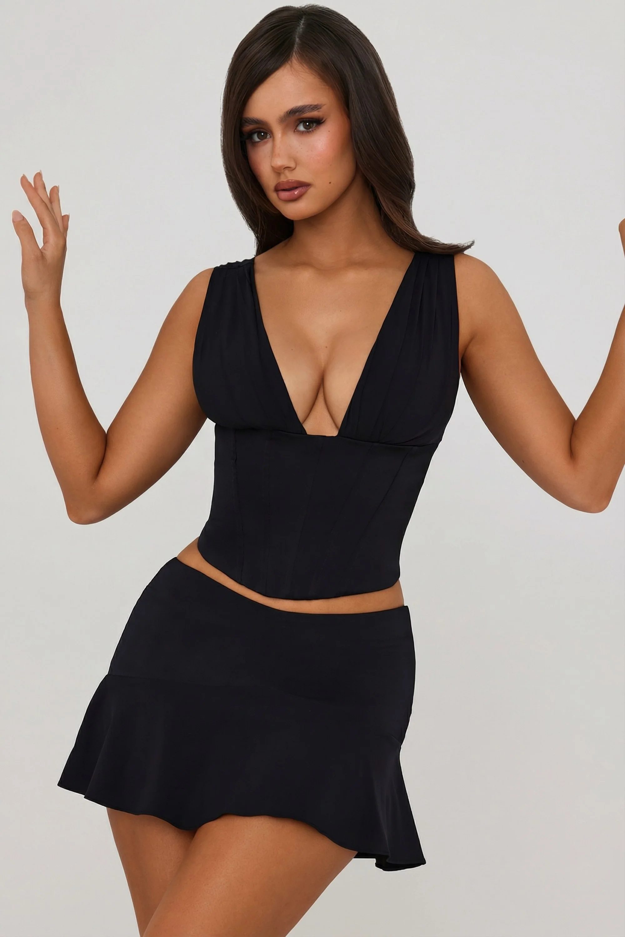 Mid-Rise Godet A-Line Mini Skirt in Black