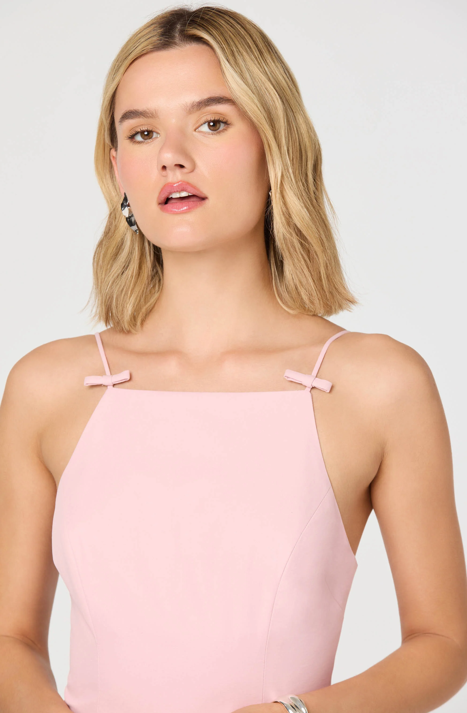 Tionna Bow-Detail Apron Neck Bubble Mini Dress