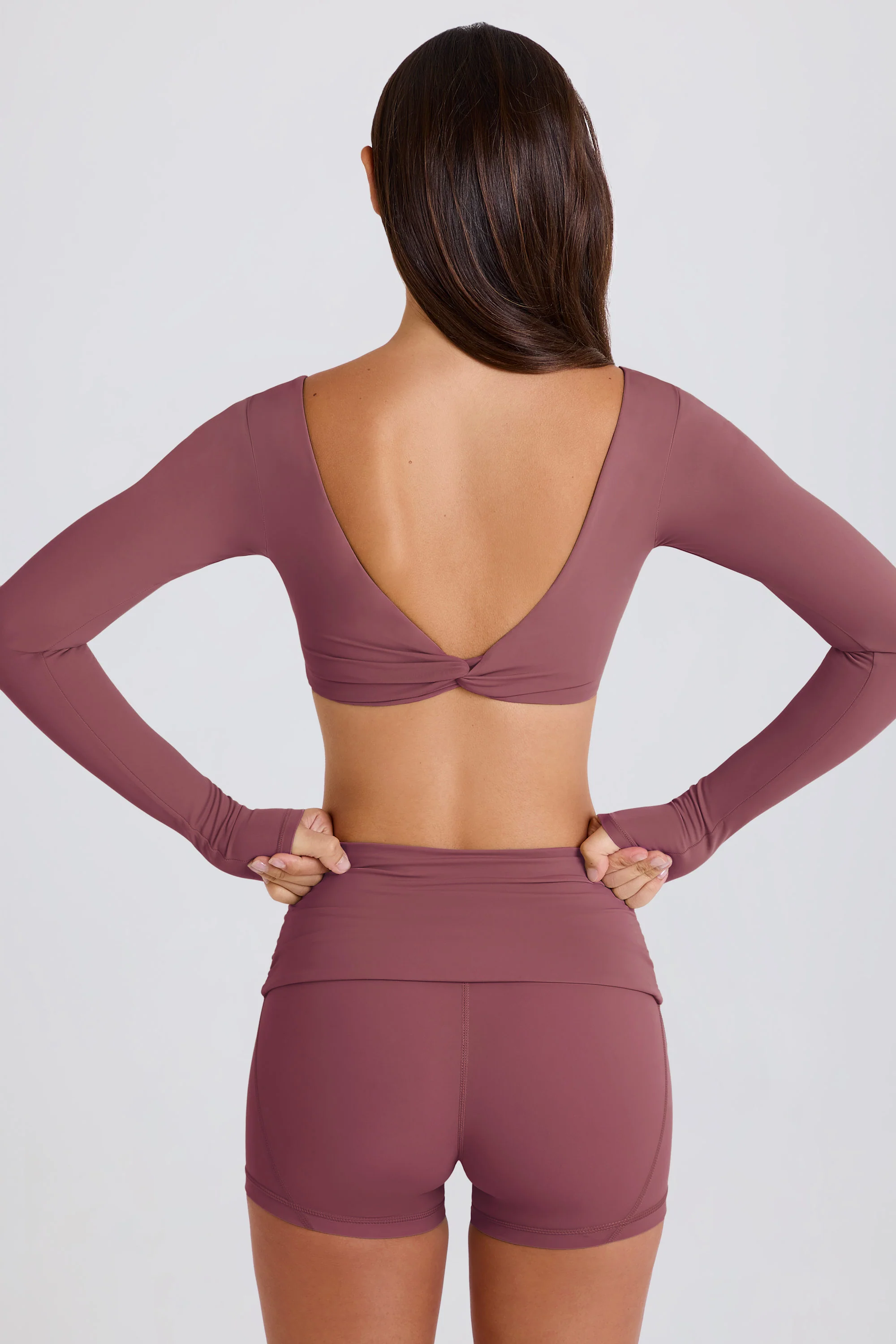 Four-Way Stretch Multiway Long-Sleeve Crop Top in Acai