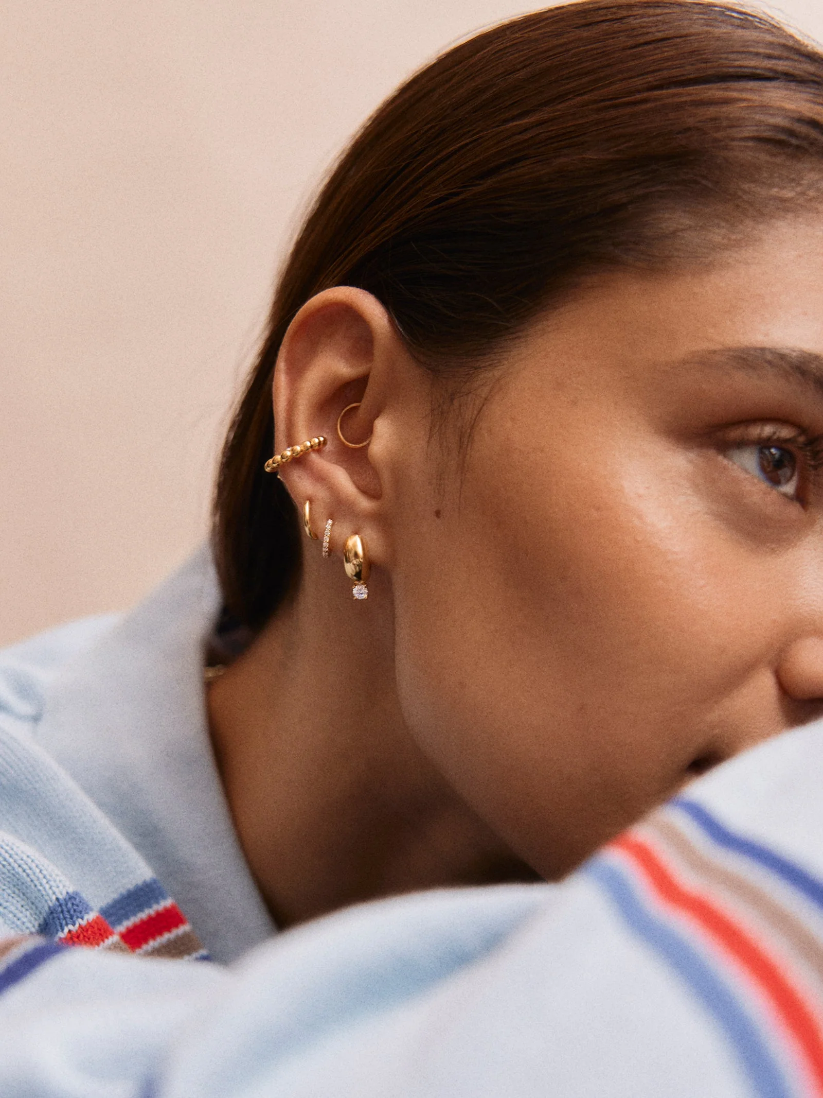 Kourtney Huggie Earrings - Kourtney Gold Plated Brass Earrings