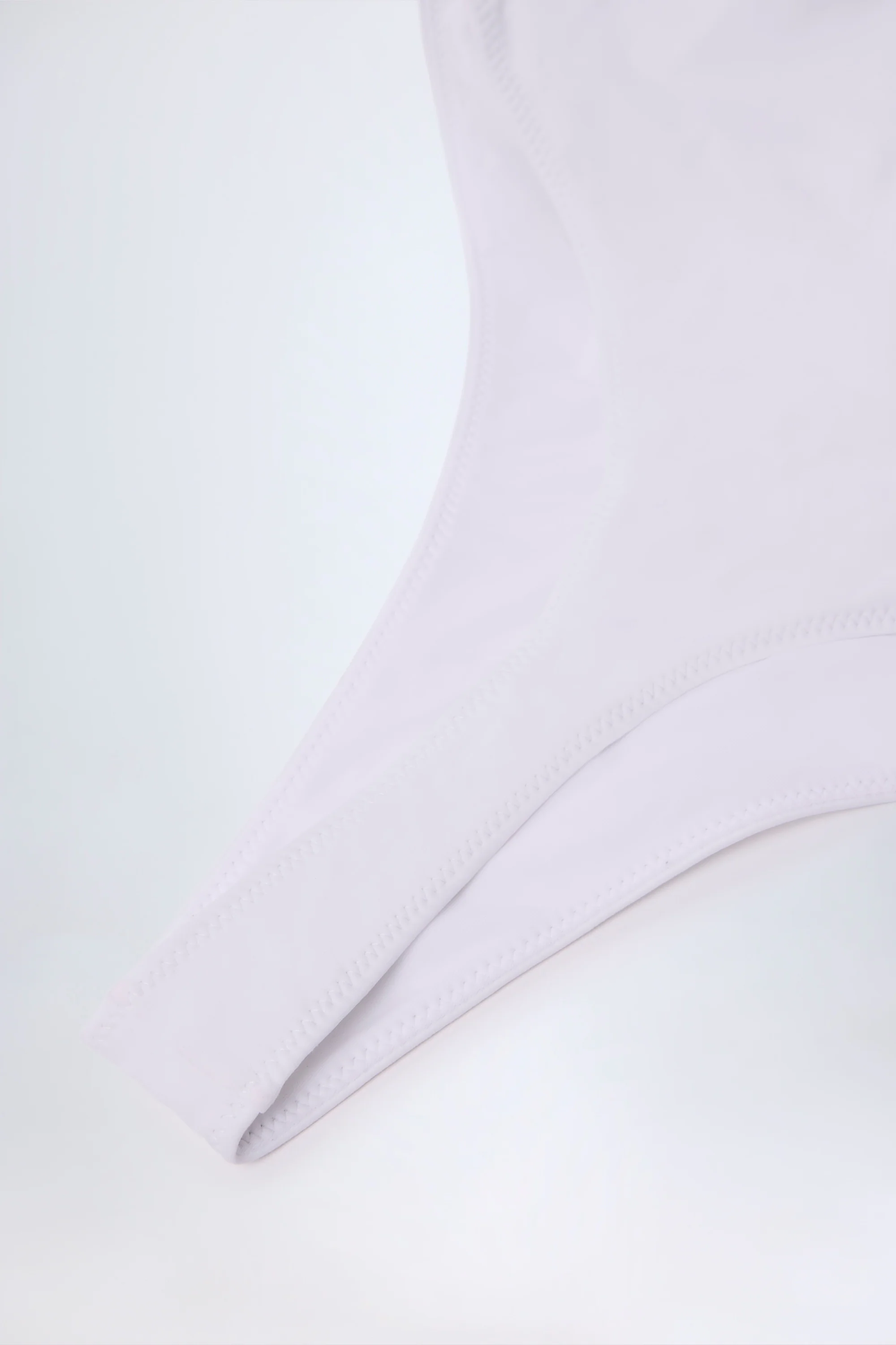 Ruffled Cut-Out Halterneck Swimsuit in White