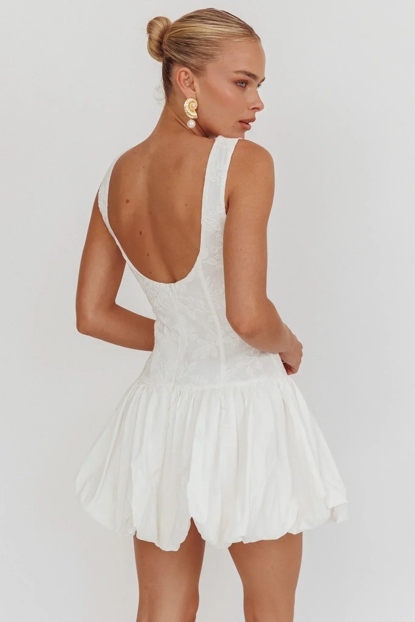 Opulent Sleeveless Bubble Hem Mini Dress Embroidered White