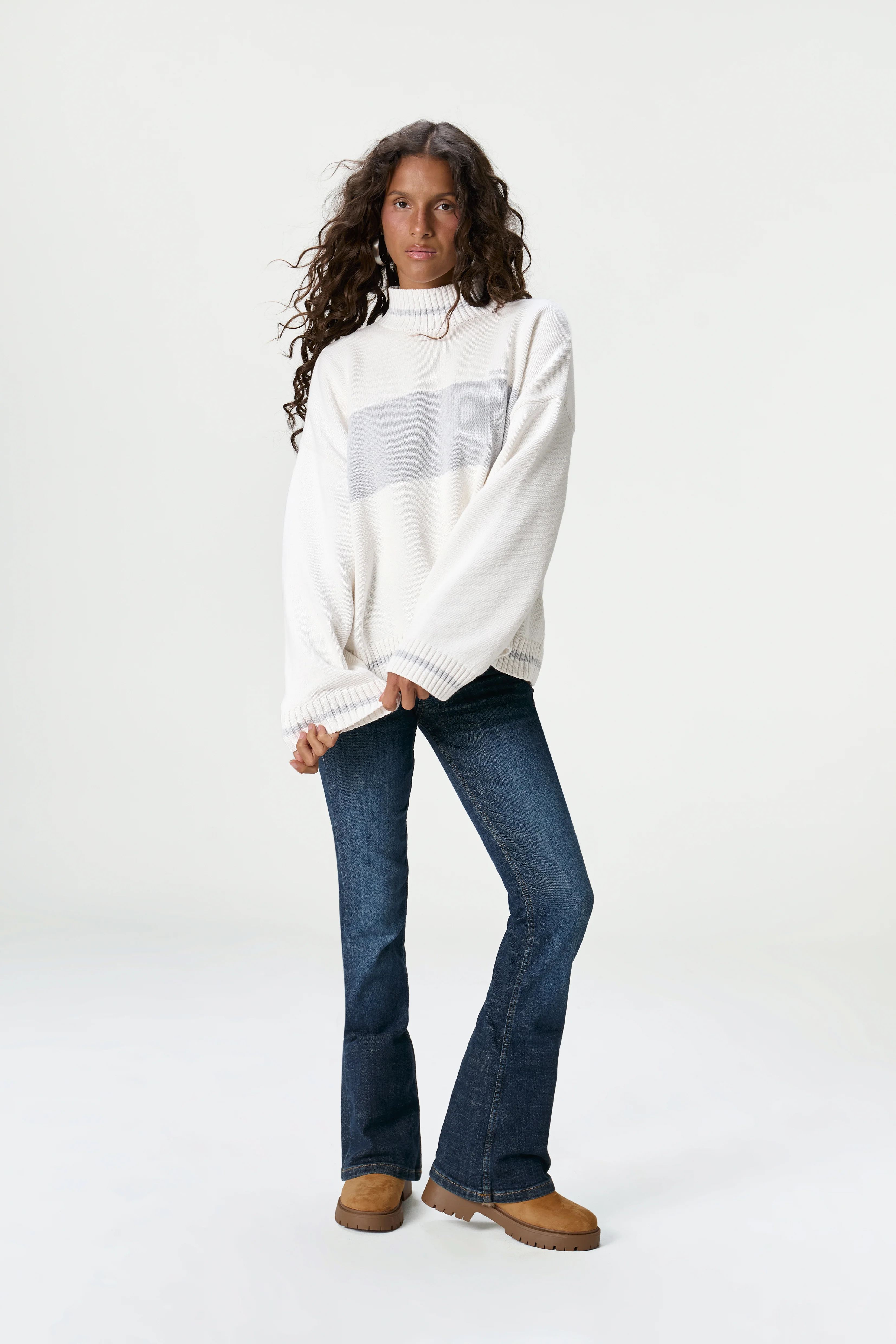 Bebe Roll Neck in Off White