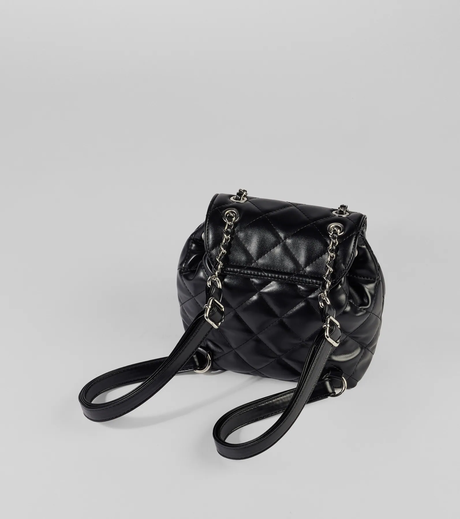 Edgy Quilted Faux Leather Mini Backpack