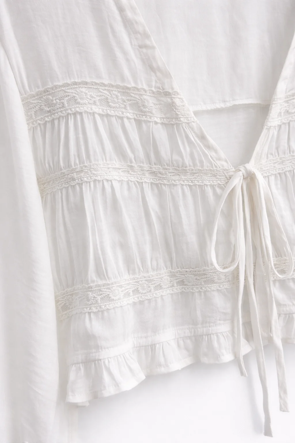 Long Sleeve Tie Front Blouse With Ruffle Detail