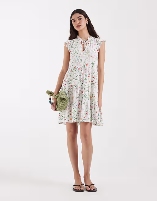 Vero Moda ruffle trim babydoll mini dress in white floral print