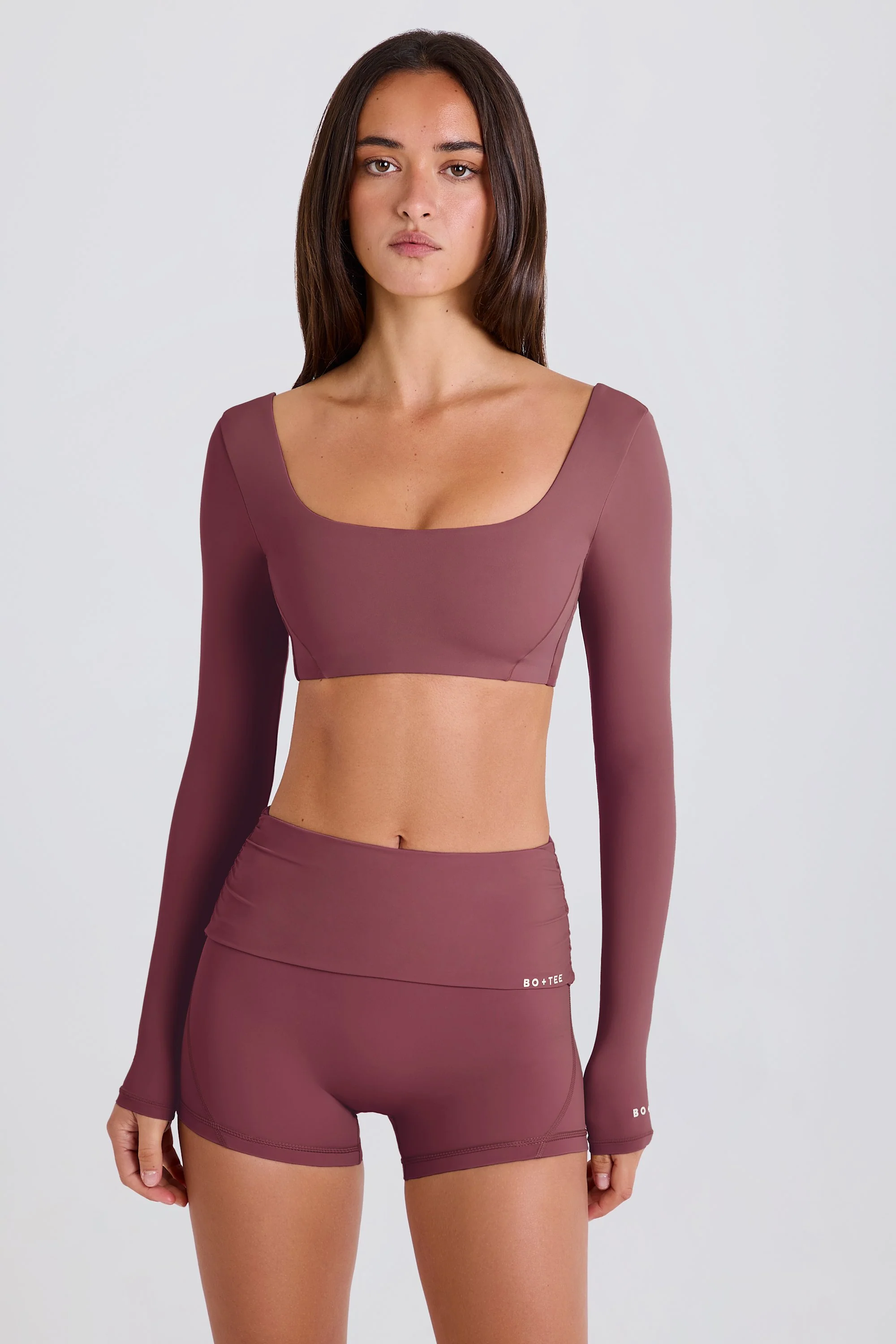 Four-Way Stretch Multiway Long-Sleeve Crop Top in Acai