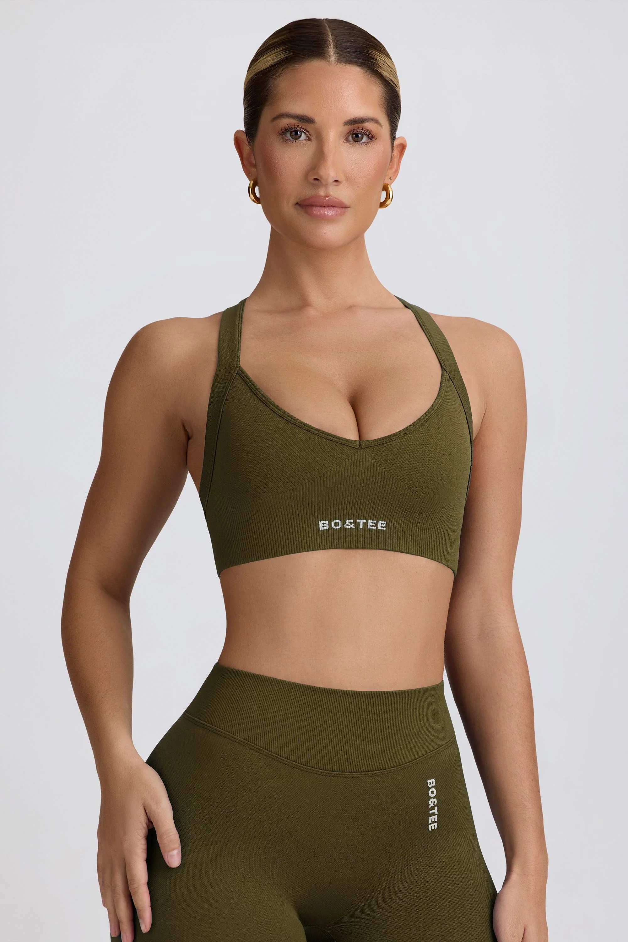Super Sculpt Seamless Cross-Back Sports Bra in Dark Green