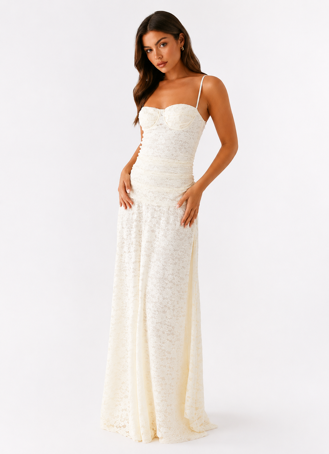 Woman wearing ivory lace fitted maxi dress studio shot