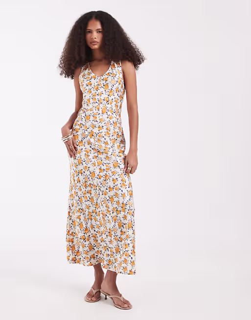AWARE sleeveless v-neck maxi dress in cream floral print