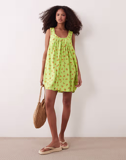 ruched neck mini sundress in green floral print performance fabric