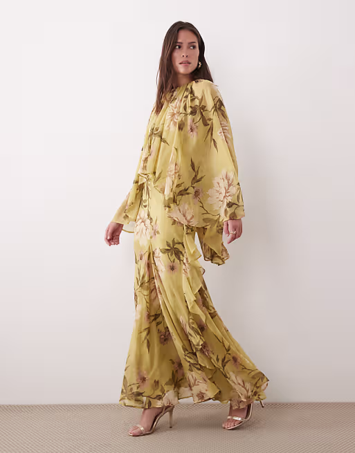 full volume cape sleeve maxi dress with godets in green floral print
