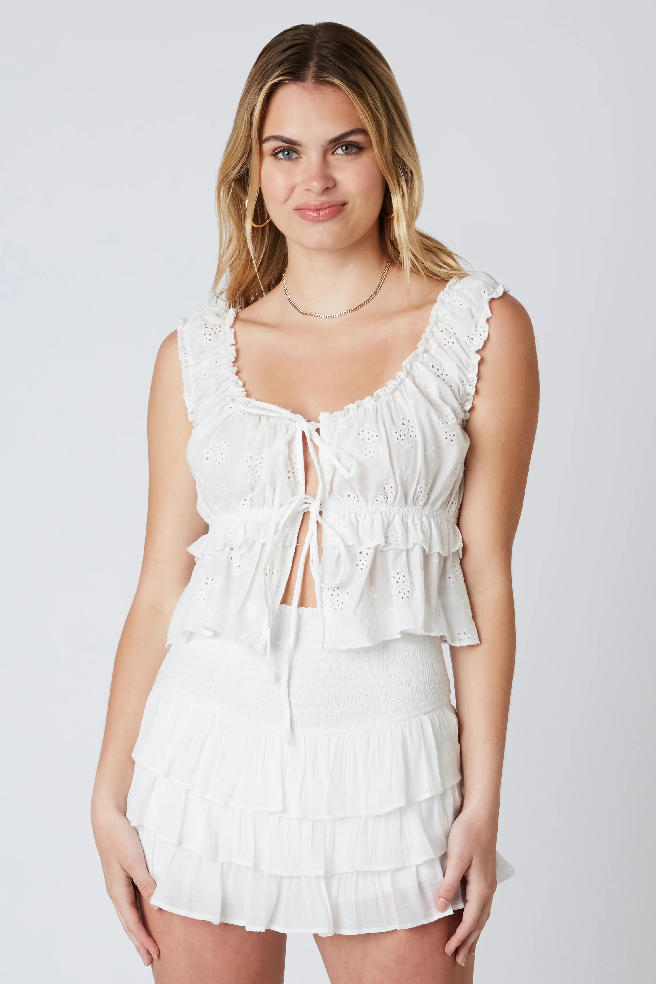 Eyelet Ruffled Peplum Top