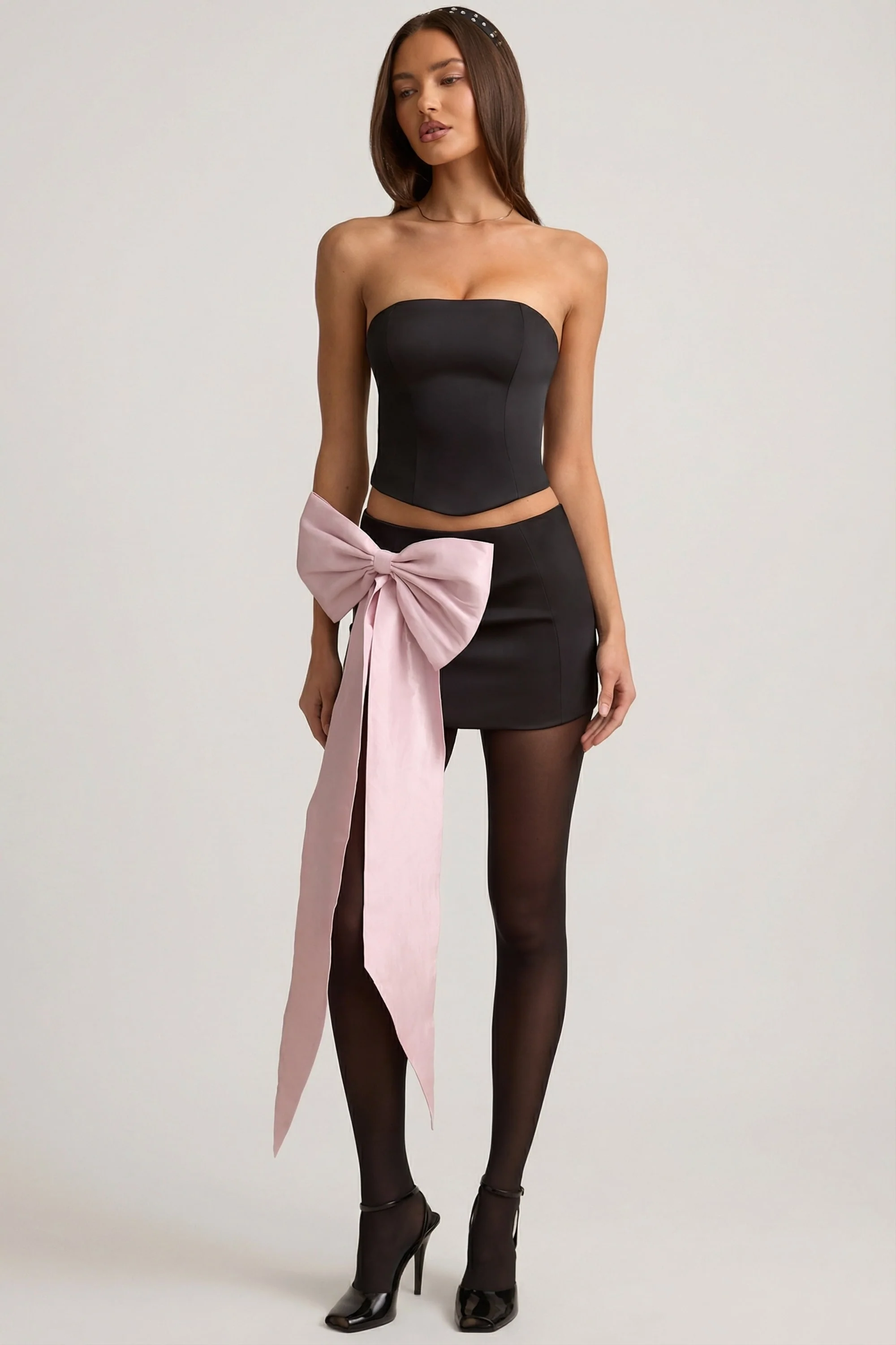 Satin Bow-Detail Low-Rise Mini Skirt in Black