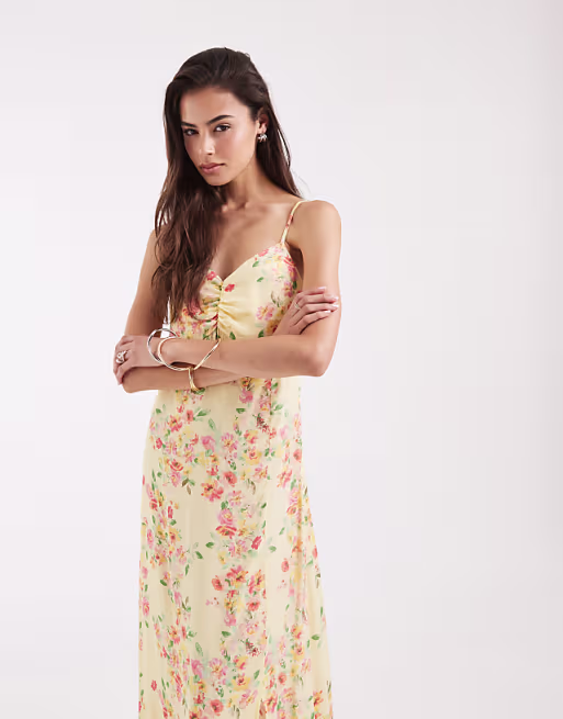 Vero Moda Tall ruched bust detailing cami midi dress in yellow based floral print