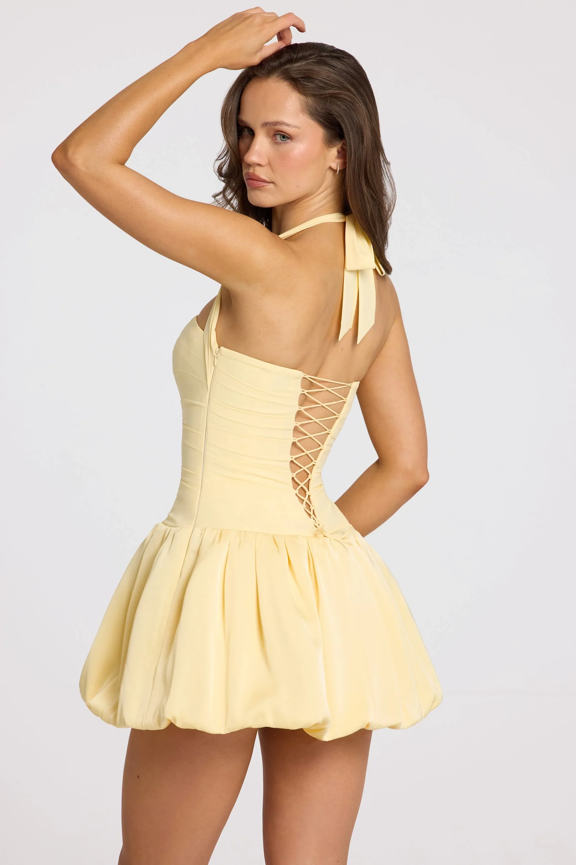 Halterneck Lace-Up Bubble Hem Corset Micro Mini Dress in Butter Yellow