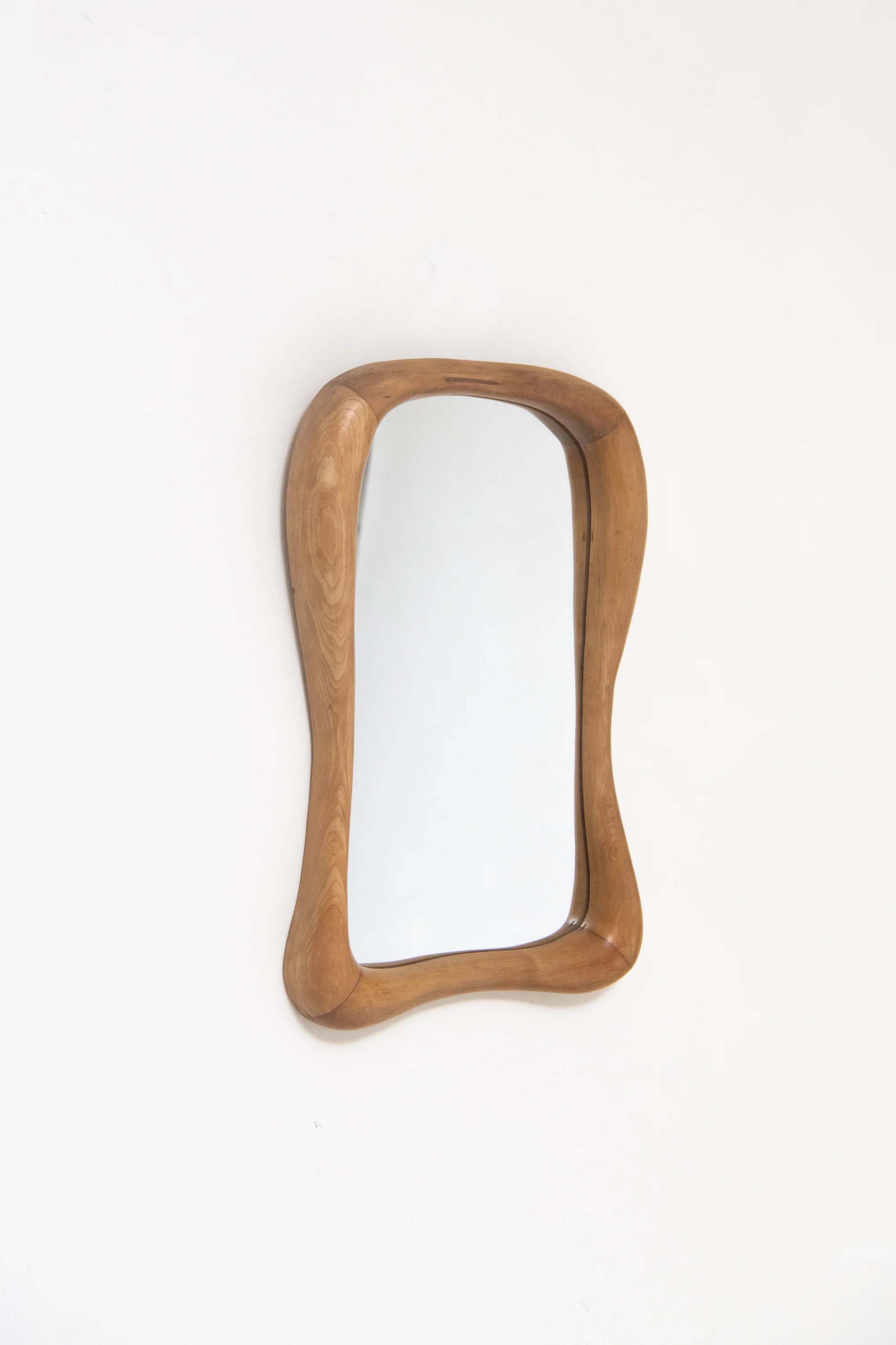 SWISS. SMOOTH CARVED ANTHROPOSOPHIC MIRROR. C. 1930