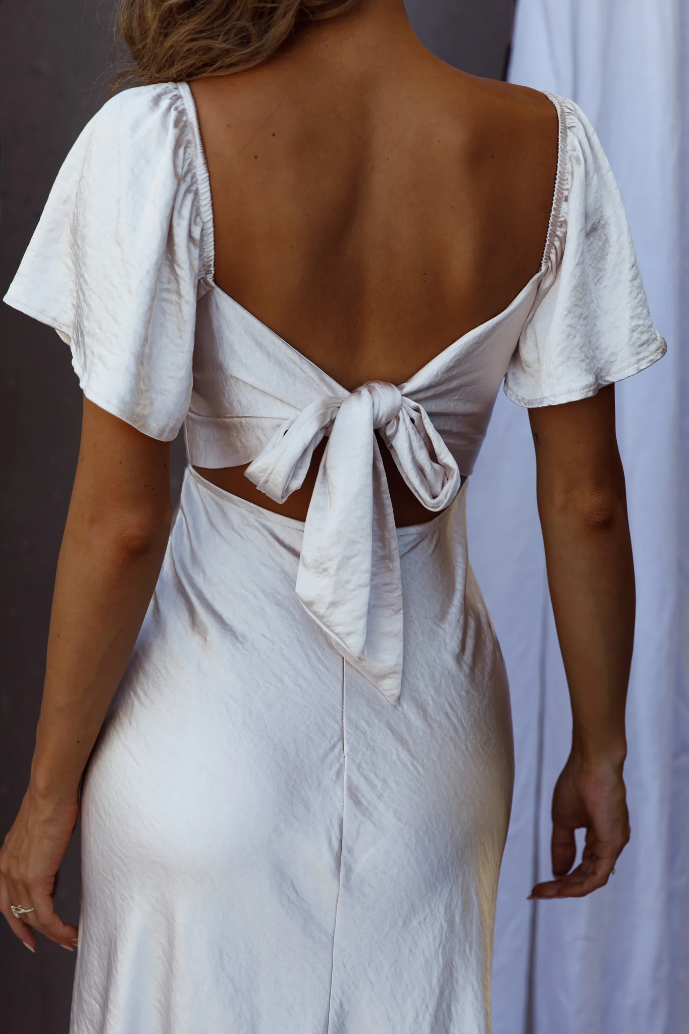 Grayson Tied Back Asymmetrical Midi Dress Champagne - luluinthesky