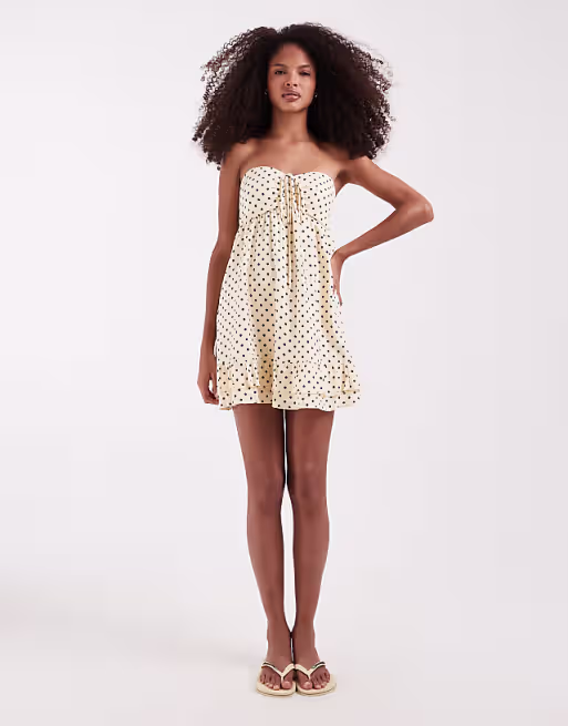 Hollister strapless tie up ruffle babydoll mini dress in yellow polka dots