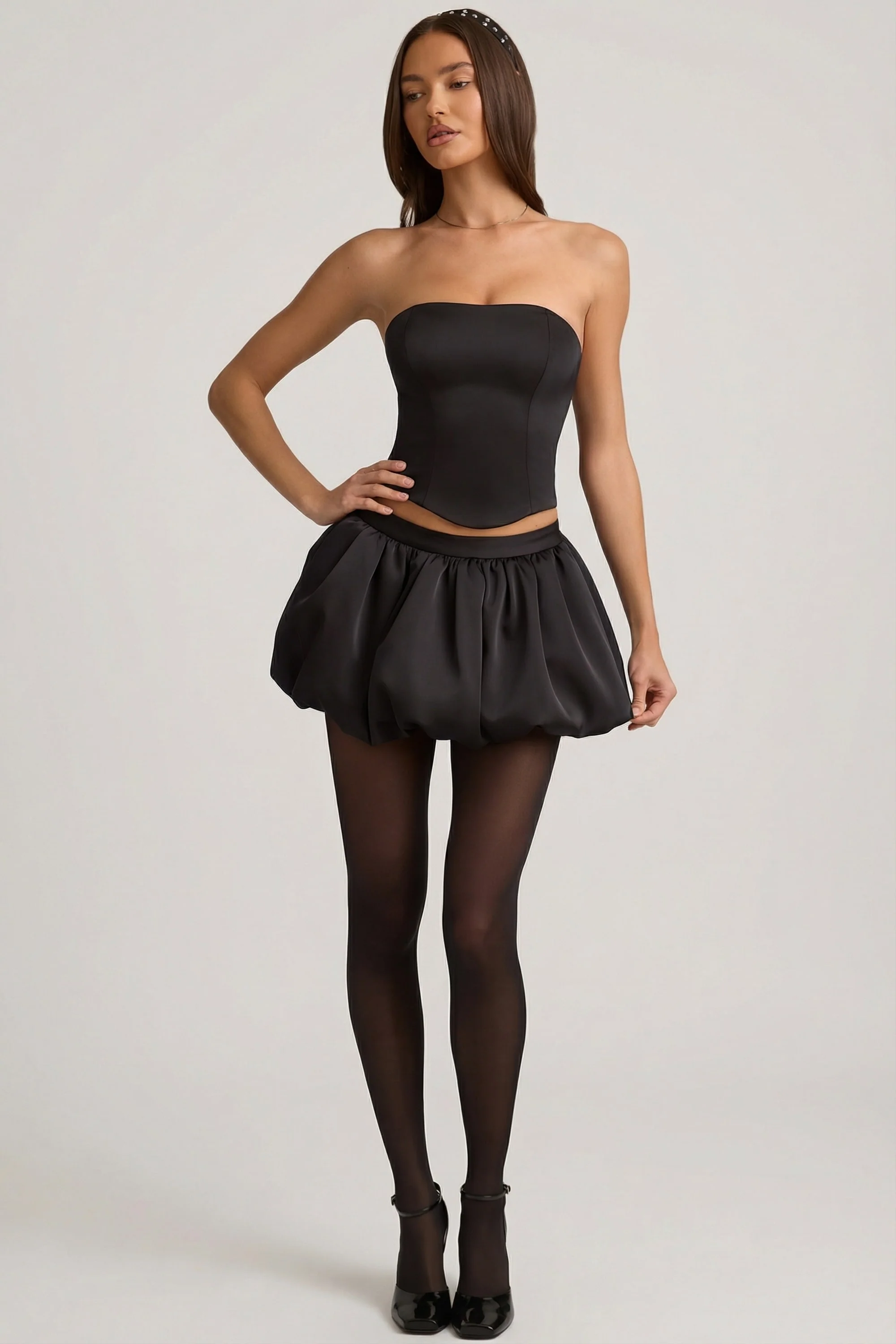 Bubble Hem Mid-Rise Mini Skirt in Black
