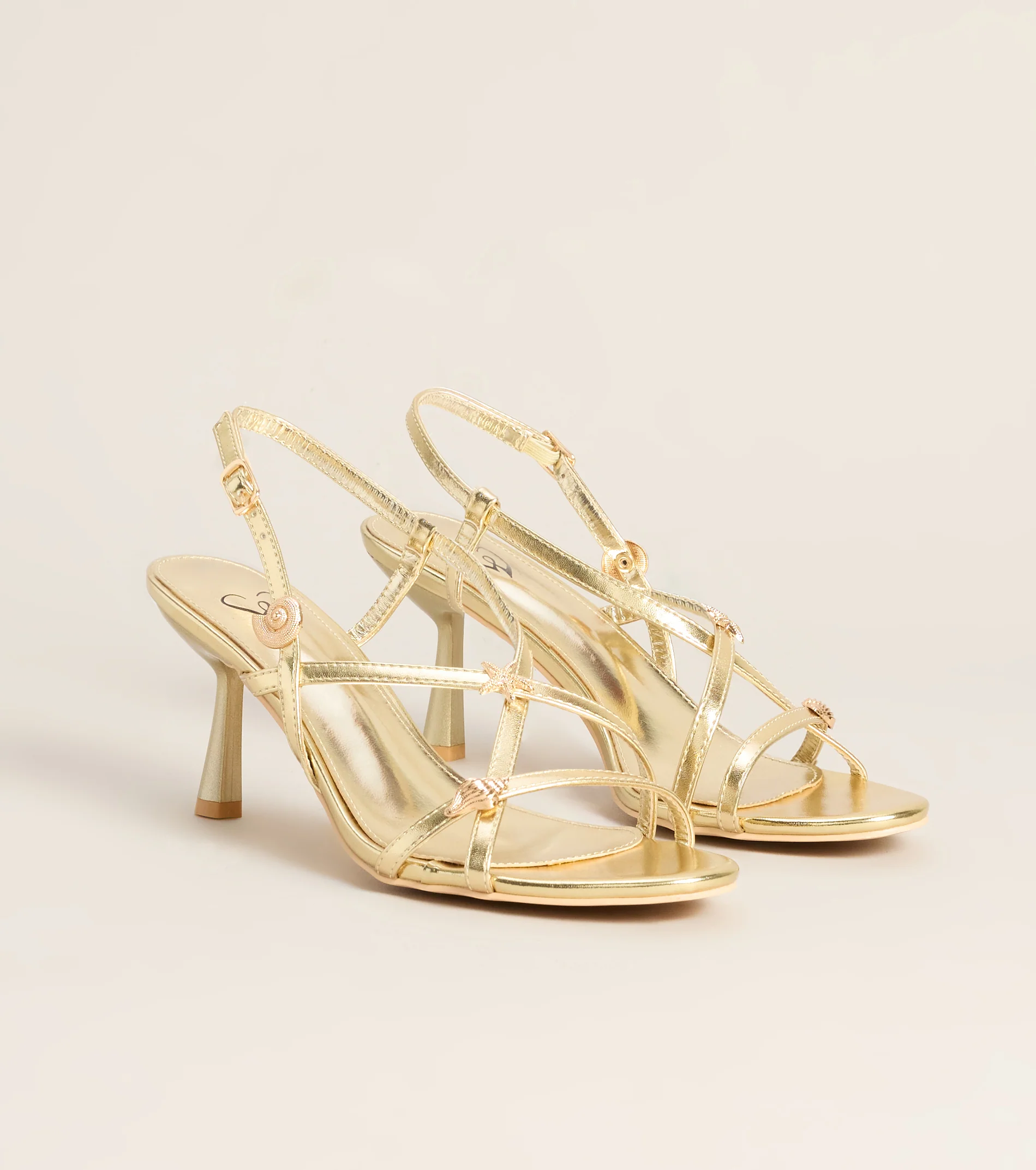 On Vacay Sea Shell Charm Metallic Heels