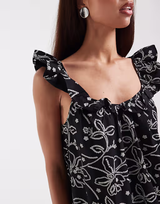 Vero Moda ruffle cami strap midi dress in black and white floral print