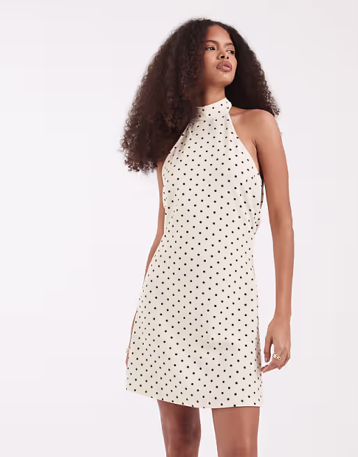 Vero Moda halter neck polka dot mini dress in cream and black