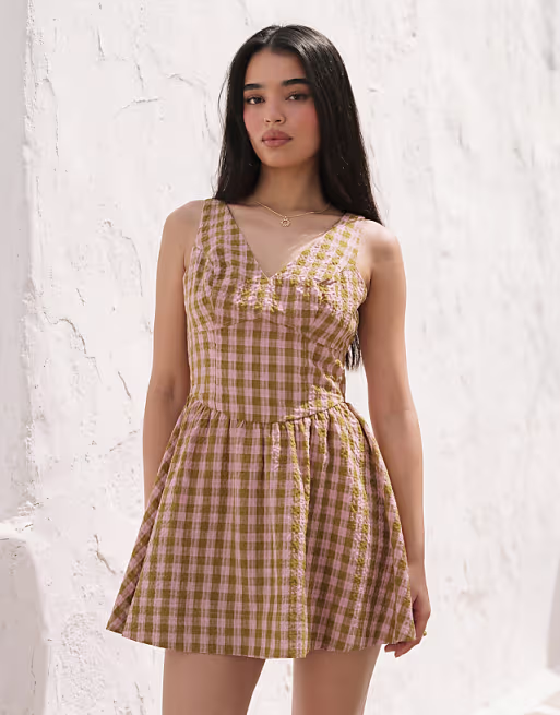 waisted V-neck mini sundress with seaming details in brown and pink check