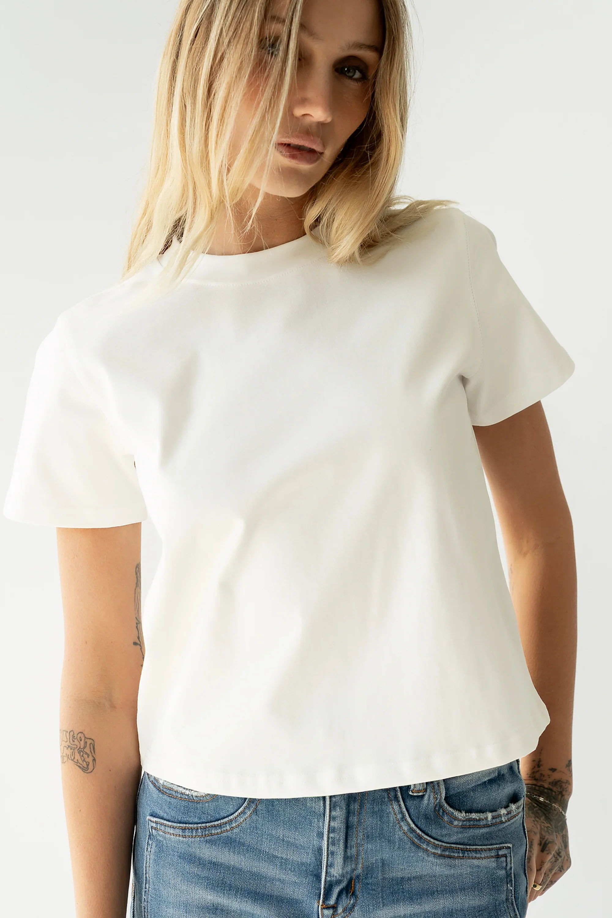 Judy Tee in White