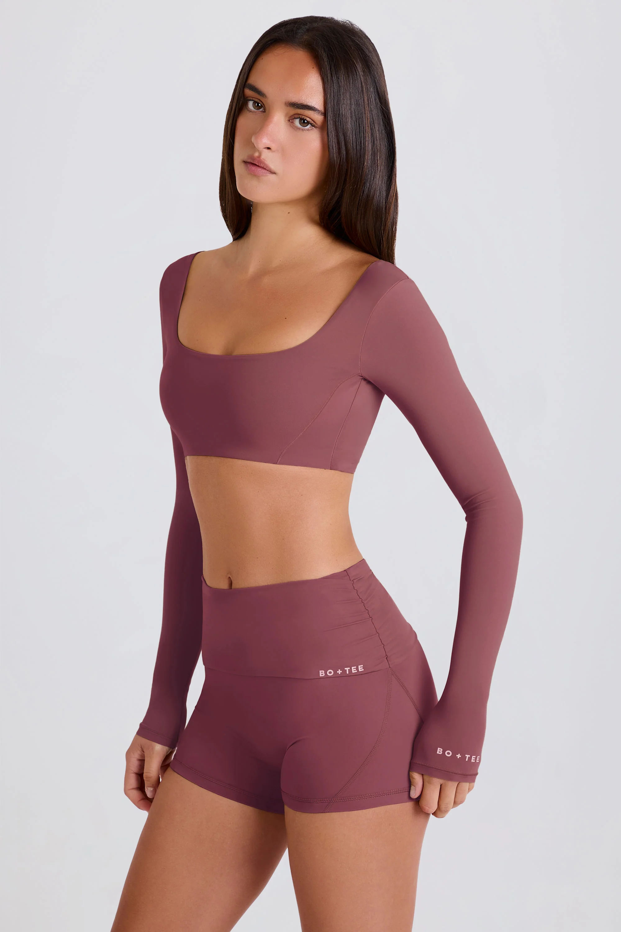 Four-Way Stretch Foldover Mid-Rise Mini Shorts in Acai