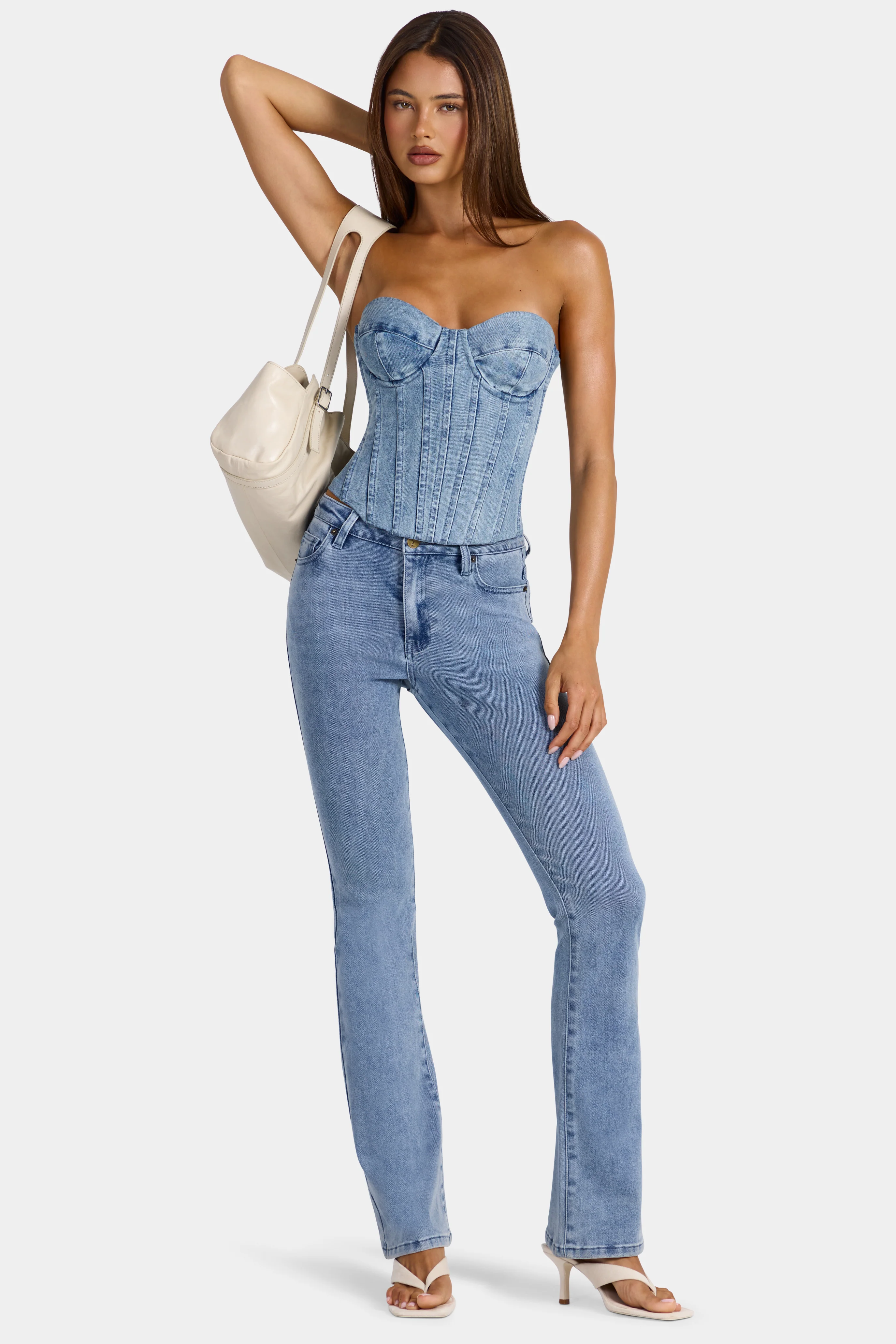 Low-Rise Flared Jeans  in Mid-Blue