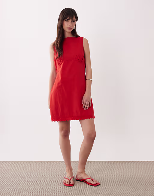 slash neck mini sundress with sculpted bust and eyelet hem in tomato red