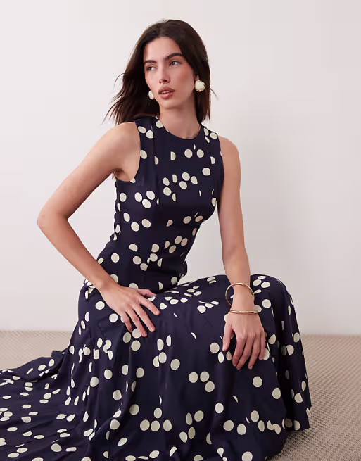 racer neck maxi dress with godets in navy polka dots