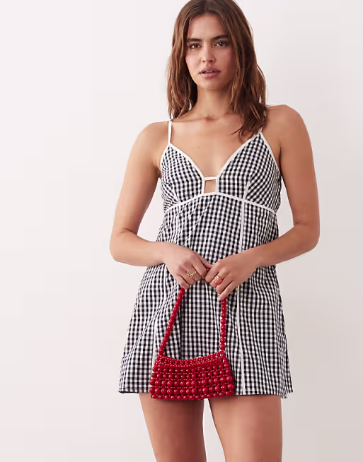 Esmée mini beach dress with contrast piping in black & white gingham