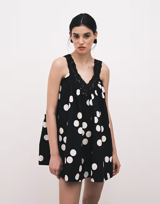 v-neck smock poplin mini sundress with lace overlay in black and white polka dots