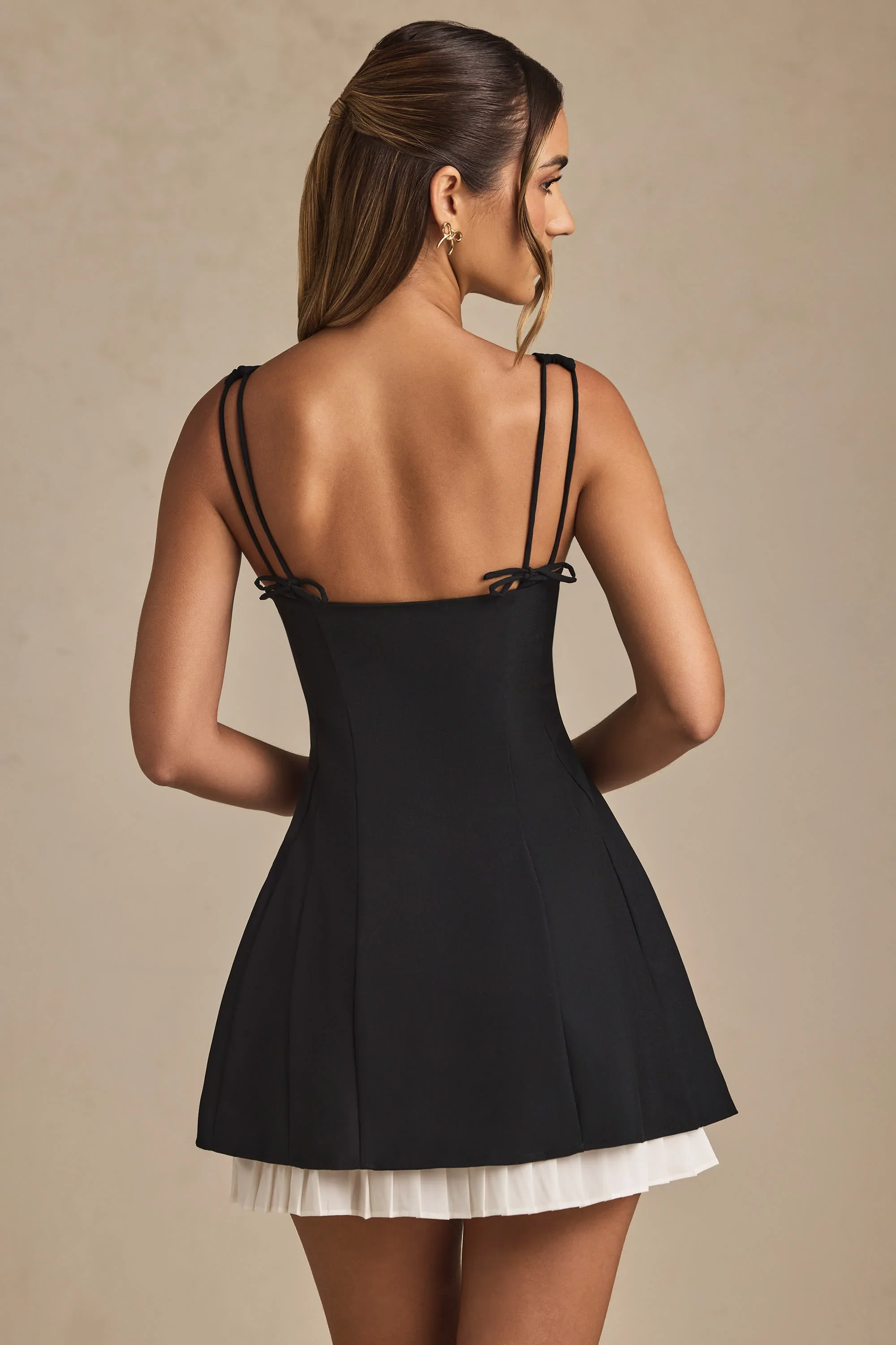 Bow-Detail Pleated A-Line Mini Dress in Black - luluinthesky