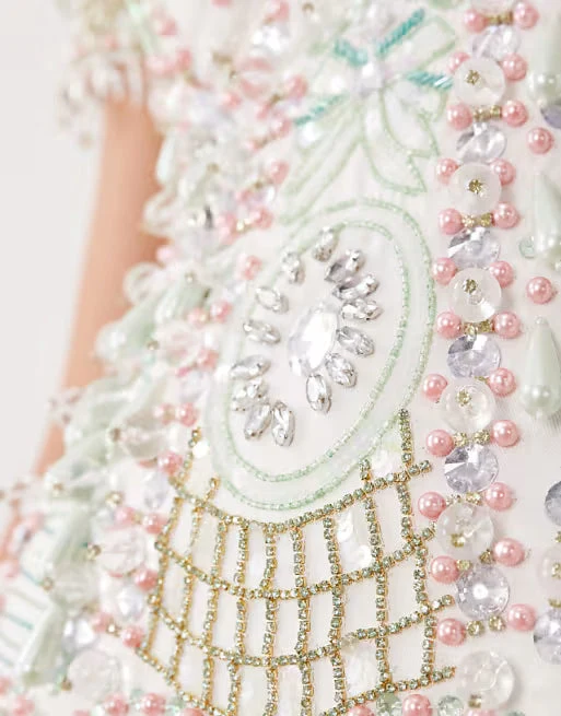 ASOS LUXE mini dress with butterfly and heart embellishment in sage and blush