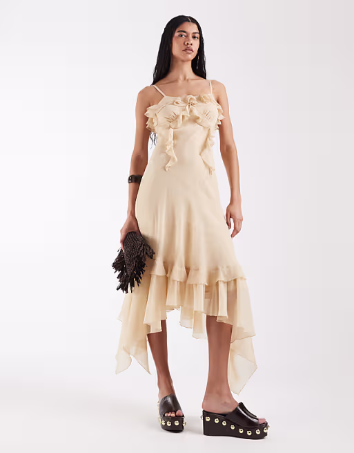 Reclaimed Vintage maxi dress with ruffle details and asymmetric hem in cream