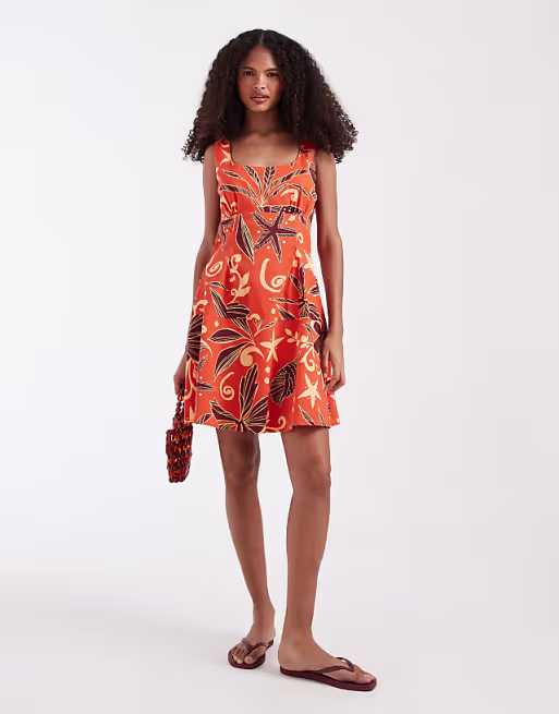Vero Moda sleeveless pleated front mini dress in orange sea shell print