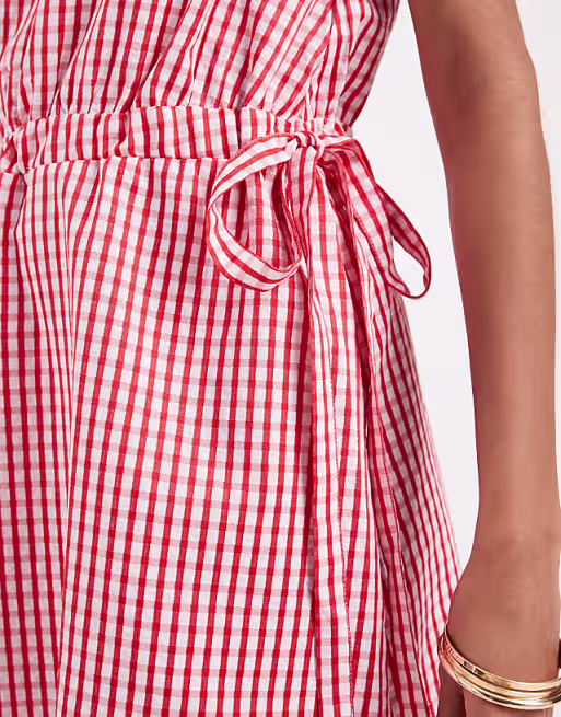 Vero Moda sleeveless bow tie side seersucker mini dress in pink and red gingham print